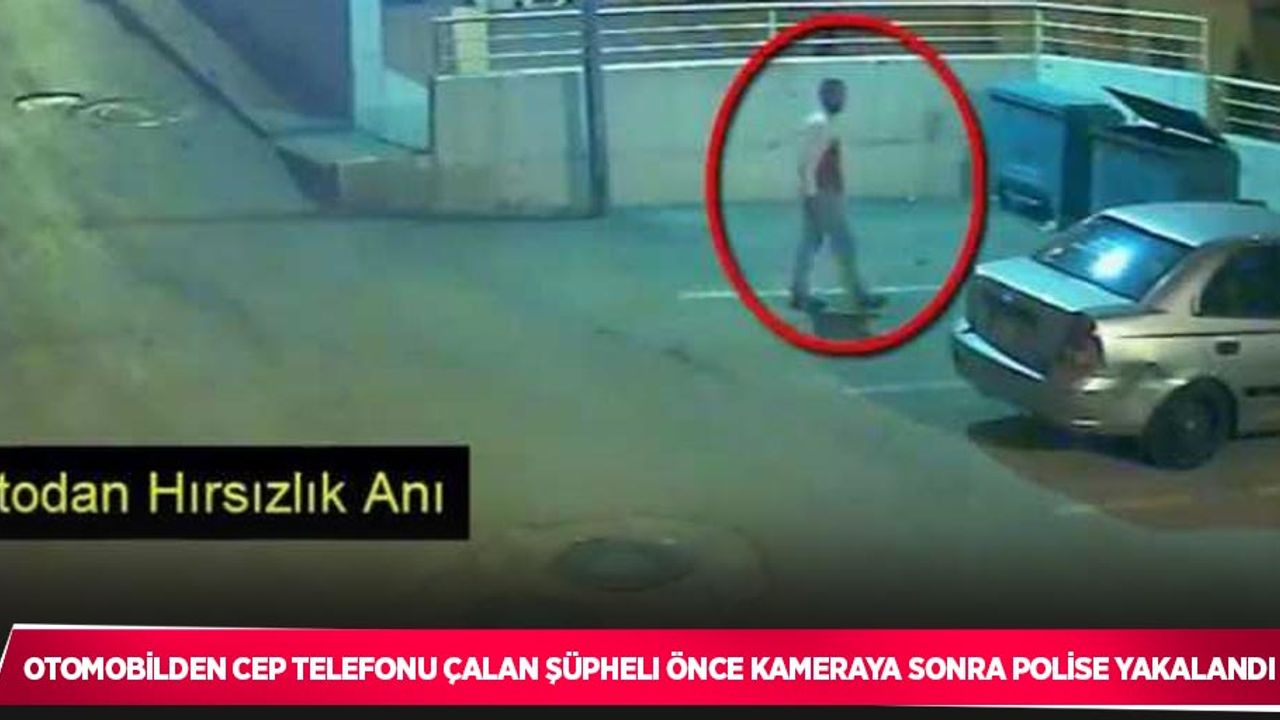 Otomobilden cep telefonu çalan şüpheli önce kameraya sonra polise yakalandı