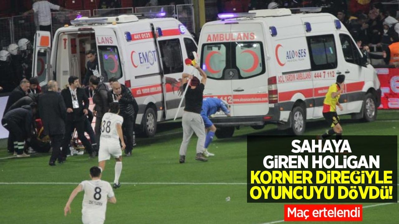 Sahaya giren holigan korner direğiyle oyuncuyu dövdü! Maç ertelendi