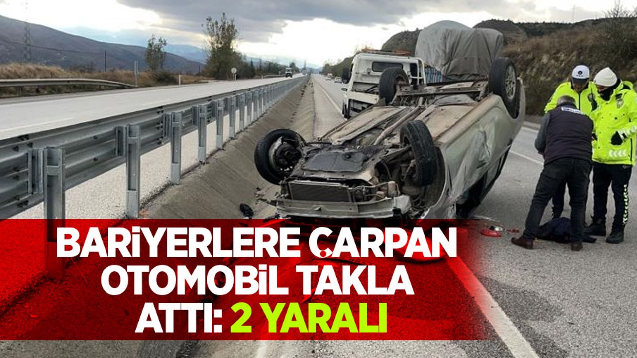 Bariyerle çarpan otomobil takla attı: 2 yaralı
