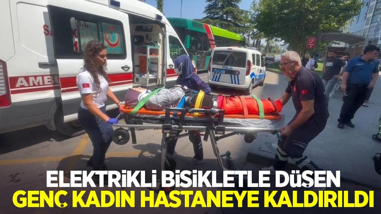 Elektrikli bisikletle düşen genç kadın hastaneye kaldırıldı