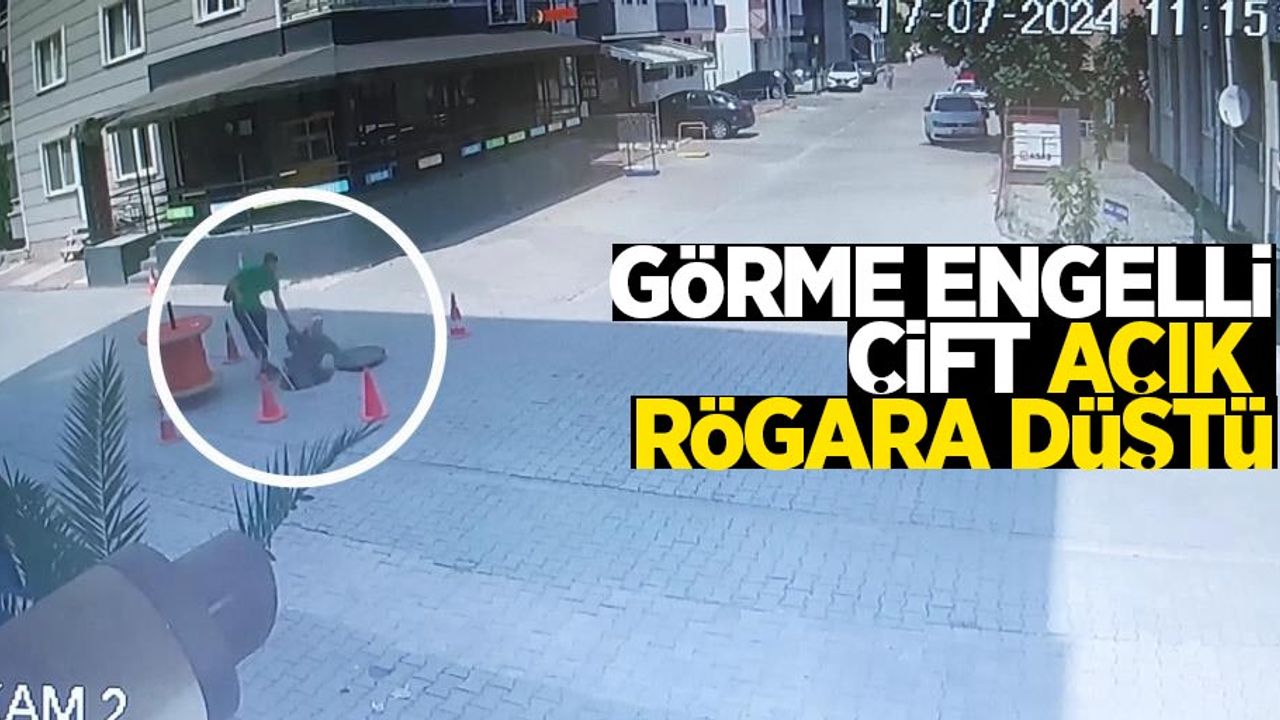 Görme engelli çift açık rögara düştü