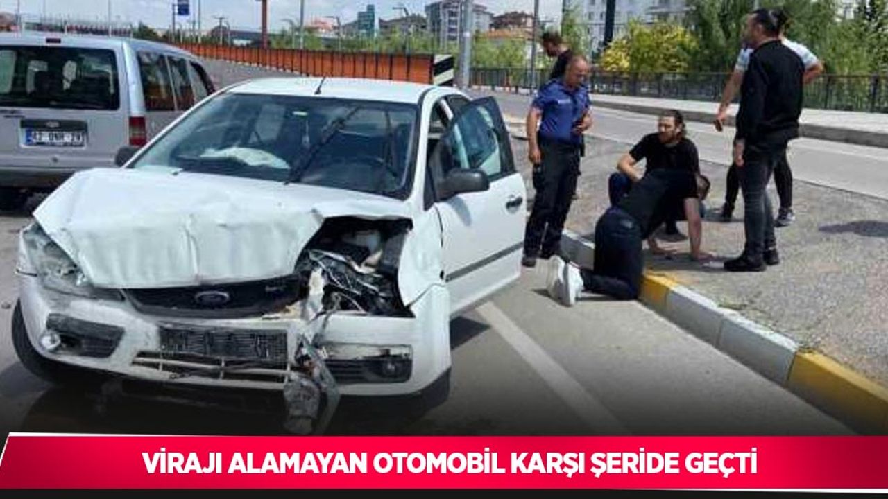 Virajı alamayan otomobil karşı şeride geçti