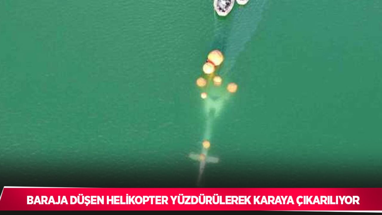 Baraja düşen helikopter yüzdürülerek karaya çıkarılıyor