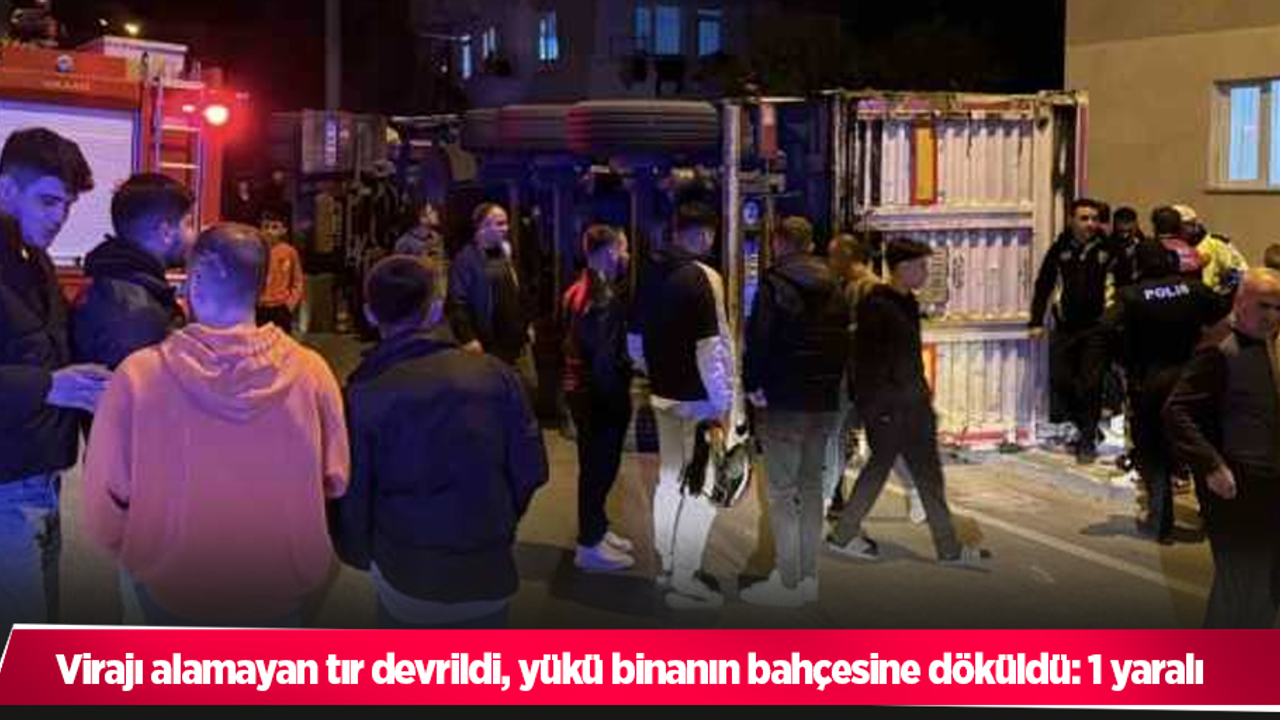 Virajı alamayan tır devrildi, yükü binanın bahçesine döküldü: 1 yaralı
