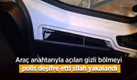 Araç anahtarıyla açılan gizli bölmeyi polis deşifre etti, silah ele geçirildi.