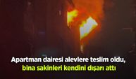 Apartman dairesi alevlere teslim oldu, bina sakinleri kendini dışarı attı