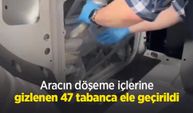 Aracın döşeme içlerine gizlenen 47 tabanca ele geçirildi