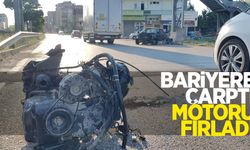 Bariyere çarptı, motoru fırladı