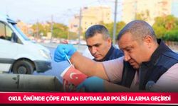 Okul önünde çöpe atılan bayraklar polisi alarma geçirdi