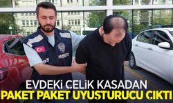 Evdeki çelik kasadan paket paket uyuşturucu çıktı