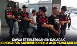 Kavga ettikleri şahsın kaçarak sığındığı evin sahibini sopayla ağır yaraladılar