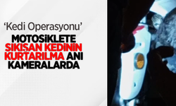 Kedi operasyonu: Motosiklete sıkışan kedinin kurtarılma anı kameralarda
