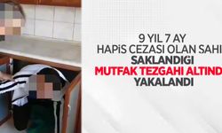 9 yıl 7 ay hapis cezası olan şahıs saklandığı mutfak tezgahı altında yakalandı
