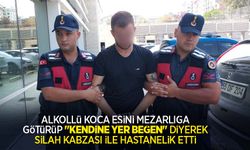 Alkollü koca eşini mezarlığa götürüp "Kendine yer beğen" diyerek silah kabzası ile hastanelik etti