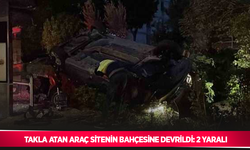 Takla atan araç sitenin bahçesine devrildi: 2 yaralı