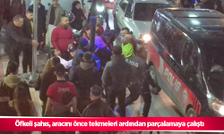 Öfkeli şahıs, aracını önce tekmeleri ardından parçalamaya çalıştı