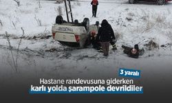 Hastane randevusuna giderken karlı yolda şarampole devrildiler: 3 yaralı