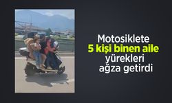 Motosiklete 5 kişi binen aile yürekleri ağza getirdi