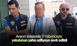 Aracın zulasında 17 tabancayla yakalanan şahıs adliyeye sevk edildi