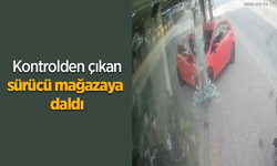 Kontrolden çıkan sürücü mağazaya daldı