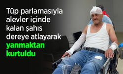Tüp parlamasıyla alevler içinde kalan şahıs dereye atlayarak yanmaktan kurtuldu