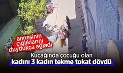 Kucağında çocuğu olan kadını 3 kadın tekme tokat dövdü.