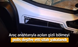 Araç anahtarıyla açılan gizli bölmeyi polis deşifre etti, silah ele geçirildi.