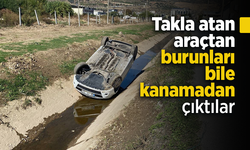 Takla atan araçtan burunları bile kanamadan çıktılar.