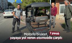 Motorlu bisiklet, yayaya yol veren otomobile çarptı: 1 yaralı