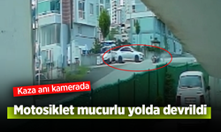 Motosiklet mucurlu yolda devrildi: Kaza anı kamerada