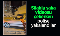 Silahla şaka videosu çekerken polise yakalandılar.