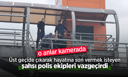 Üst geçide çıkarak hayatına son vermek isteyen şahsı polis ekipleri vazgeçirdi.
