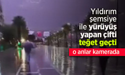 Yıldırım şemsiye ile yürüyüş yapan çifti teğet geçti.