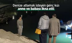 Denize atlamak isteyen genç kızı anne ve babası ikna etti