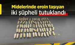 Midelerinde eroin taşıyan iki şüpheli tutuklandı