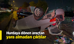 Hurdaya dönen araçtan yara almadan çıktılar