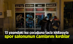 13 yaşındaki kız çocuğuna taciz iddiasıyla spor salonunun camlarını kırdılar