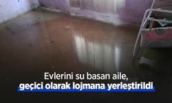 Evlerini su basan aile, geçici olarak lojmana yerleştirildi