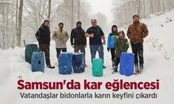 Samsun'da kar eğlencesi: Vatandaşlar bidonlarla karın keyfini çıkardı