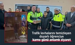 Trafik levhalarını temizleyen duyarlı öğrenciye karne günü anlamlı ziyaret