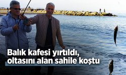Balık kafesi yırtıldı, oltasını alan sahile koştu