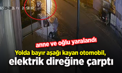 Yolda bayır aşağı kayan otomobil, elektrik direğine çarptı; anne ve oğlu yaralandı