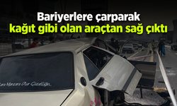 Bariyerlere çarparak kağıt gibi olan araçtan sağ çıktı