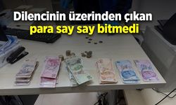 Dilencinin üzerinden çıkan para say say bitmedi