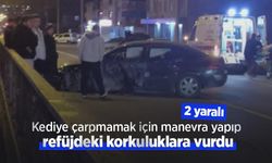 Kediye çarpmamak için manevra yapıp refüjdeki korkuluklara vurdu; 2 yaralı