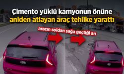 Çimento yüklü kamyonun önüne aniden atlayan araç tahlike yarattı