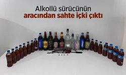 Alkollü sürücünün aracından sahte içki çıktı