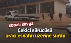 Sopalı kavga: Çekici sürücüsü aracı esnafın üzerine sürdü