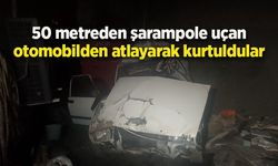 50 metreden şarampole uçan otomobilden atlayarak kurtuldular