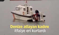 Denize atlayan kadını itfaiye eri kurtardı